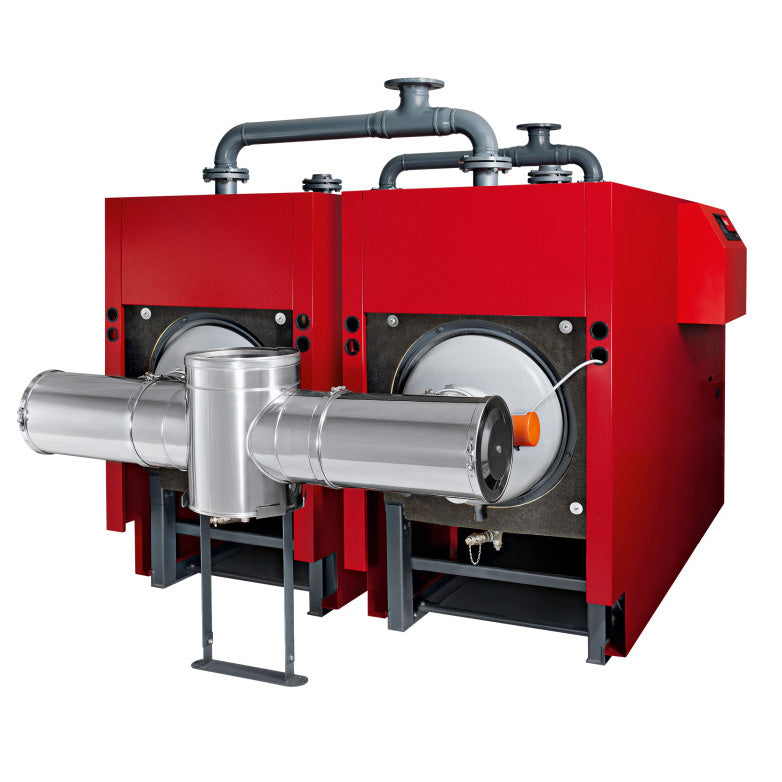 Back view of two red Hoval industrial boilers connected by metal pipes on the top with a large cylindrical tubing system connecting the back of the machines set on a white background