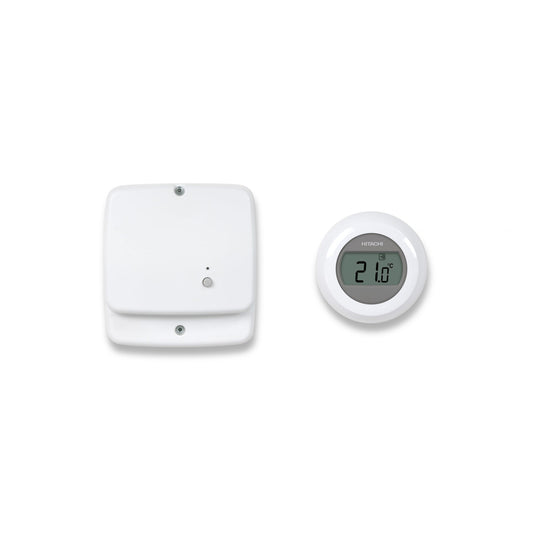 White thermostat and digital temperature display on a white background