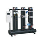Industrial water distribution system with multiple cylindrical tanks and control panels on a white background